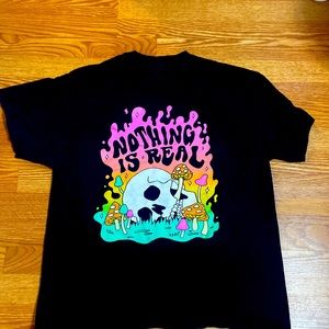 Nothing Is Real Spencers Graphic Tee